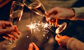 Toasting with champagne and sparklers is a New Year’s tradition, or is it a ritual? Source: Valerii/Adobe Stock