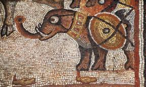 Elephant Mosaic, Huqoq, Galilee region, Israel, featuring an elephant alongside other soldiers and war animals, as well as an elder holding a scroll surrounded by young men with sheathed swords.