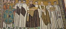 Mosaic of Emperor Justinian I and his retinue, from the Church of Sa Vitale in Ravenna, Italy. 