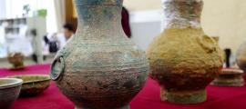 A pair of bronze pots, one containing the first real example of an ancient Chinese elixir of life, were unearthed from a Western Han Dynasty tomb in Luoyang, Henan Province.