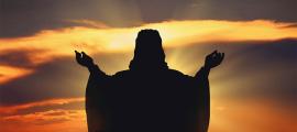 Silhouette Jesus in the sunset. Source: artphotoclub / Adobe Stock
