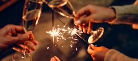 Toasting with champagne and sparklers is a New Year’s tradition, or is it a ritual? Source: Valerii/Adobe Stock