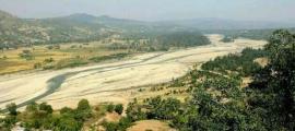 View of the Lailea River from on top of the hill containing Laili rockshelter. Source: Mike Morley/The Conversation
