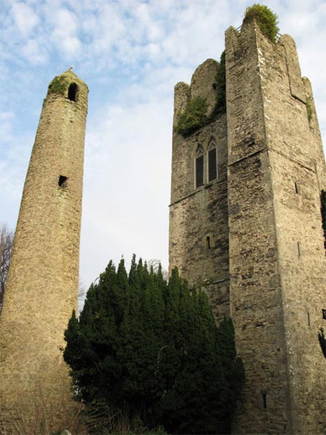 The round tower and a former 14th century abbey church tower in Swords, Co. Dublin, Ireland. (Peter Gerken/CC BY SA 2.0)